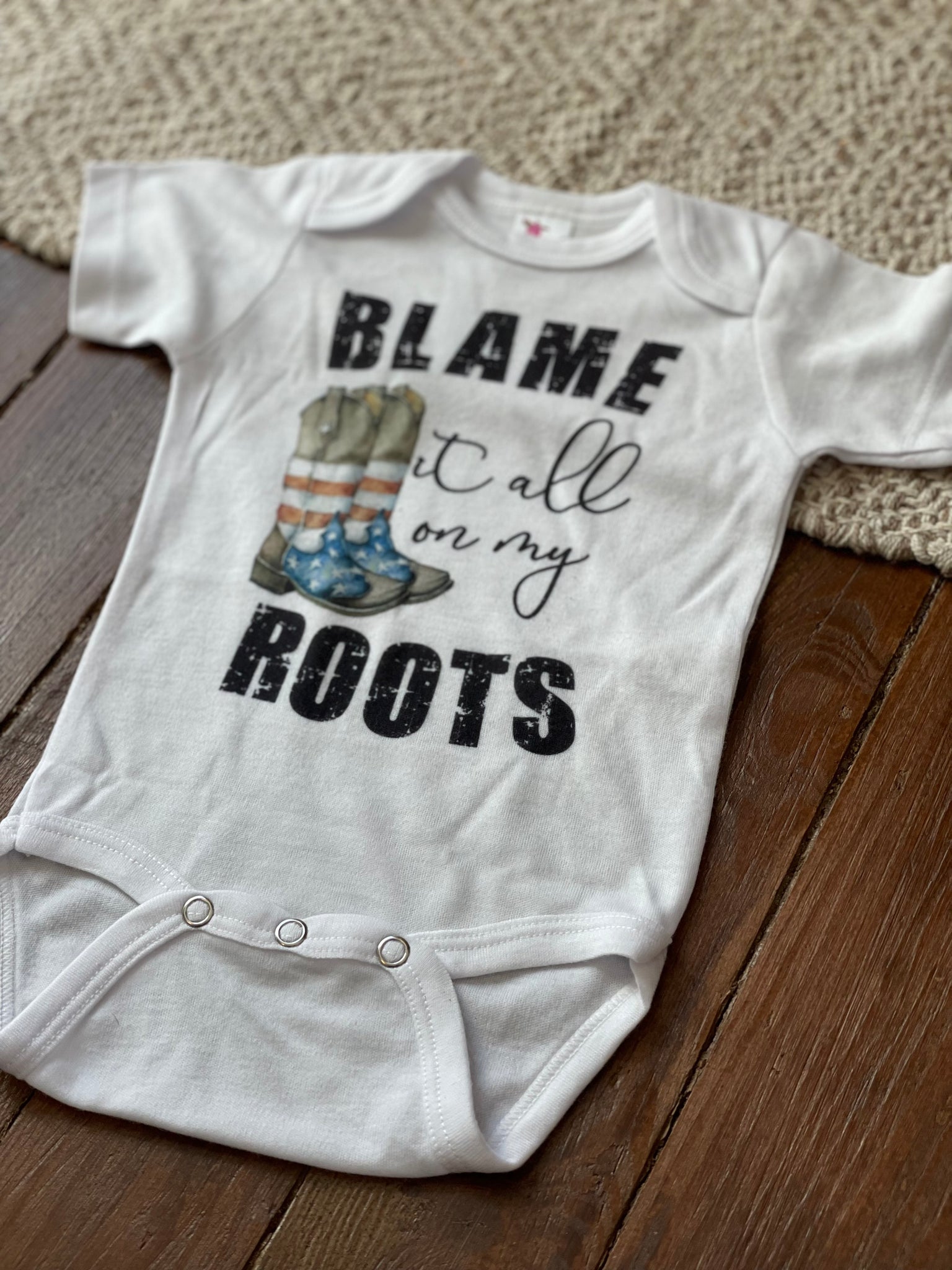 Blame It All On My Roots Onesie