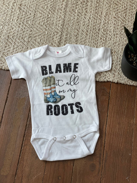 Blame It All On My Roots Onesie